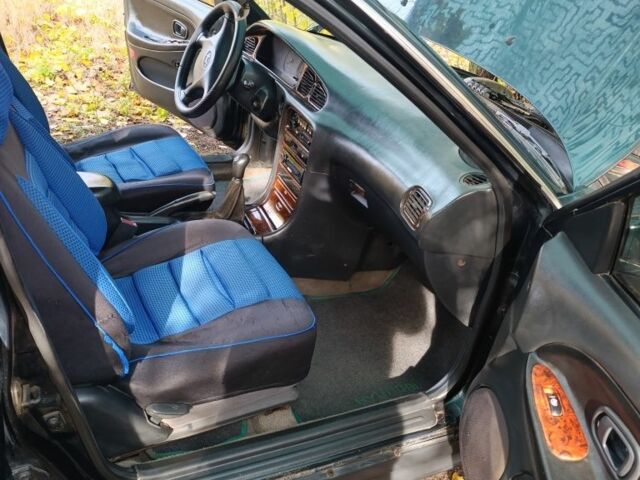 Зеленый Хендай Соната, объемом двигателя 2 л и пробегом 311 тыс. км за 1903 $, фото 6 на Automoto.ua