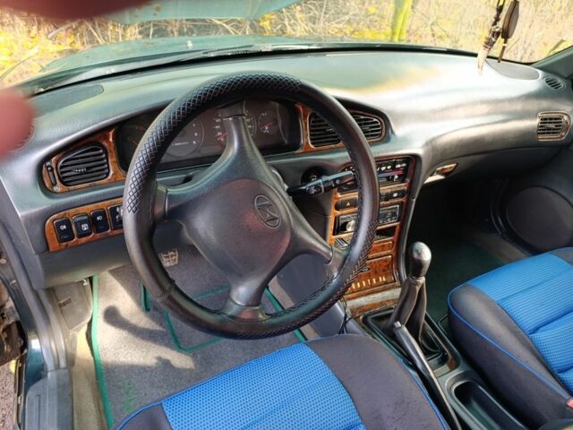 Зеленый Хендай Соната, объемом двигателя 2 л и пробегом 311 тыс. км за 1903 $, фото 3 на Automoto.ua