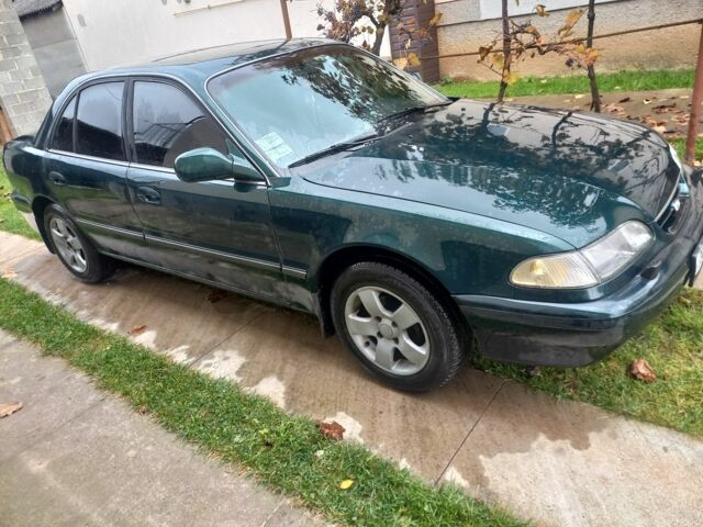 Зеленый Хендай Соната, объемом двигателя 2 л и пробегом 308 тыс. км за 1800 $, фото 10 на Automoto.ua