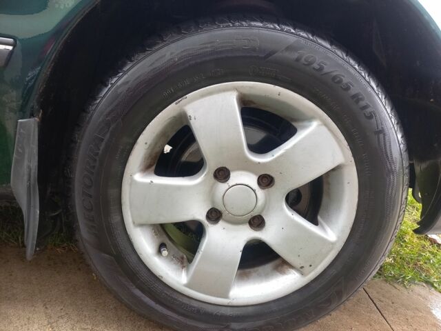 Зеленый Хендай Соната, объемом двигателя 2 л и пробегом 308 тыс. км за 1800 $, фото 9 на Automoto.ua