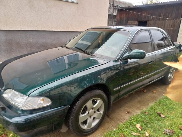 Зеленый Хендай Соната, объемом двигателя 2 л и пробегом 308 тыс. км за 1800 $, фото 4 на Automoto.ua