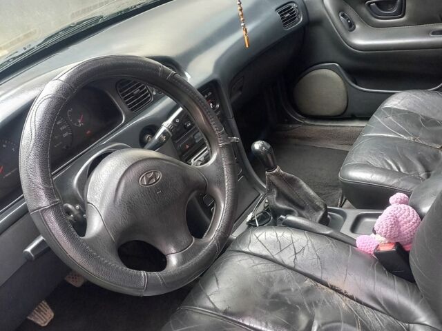 Зеленый Хендай Соната, объемом двигателя 2 л и пробегом 308 тыс. км за 1800 $, фото 8 на Automoto.ua