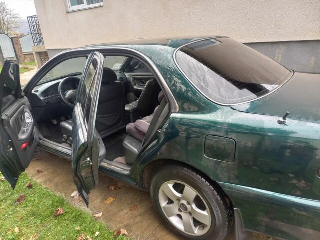 Зеленый Хендай Соната, объемом двигателя 2 л и пробегом 308 тыс. км за 1800 $, фото 6 на Automoto.ua