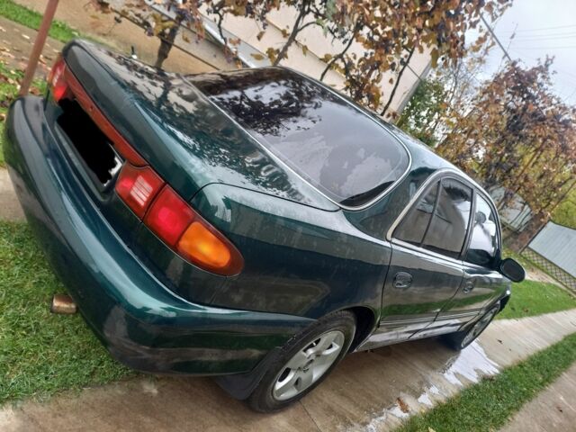 Зеленый Хендай Соната, объемом двигателя 2 л и пробегом 308 тыс. км за 1800 $, фото 1 на Automoto.ua