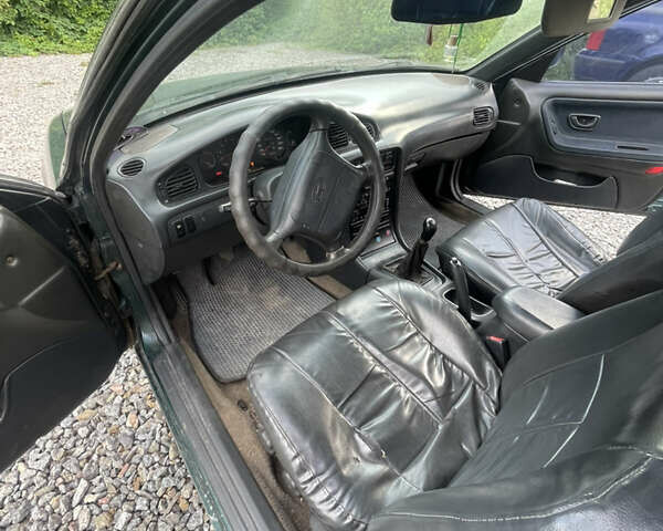 Зеленый Хендай Соната, объемом двигателя 2 л и пробегом 291 тыс. км за 1550 $, фото 7 на Automoto.ua