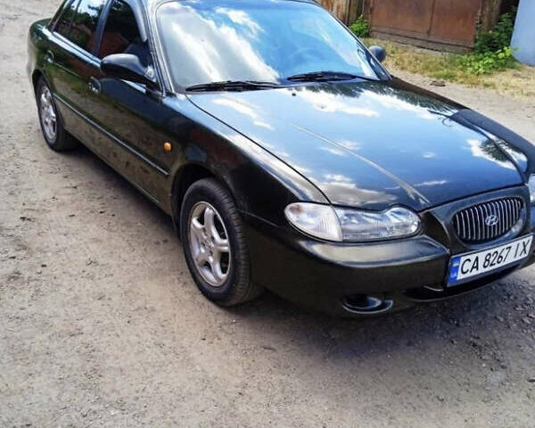 Зеленый Хендай Соната, объемом двигателя 2 л и пробегом 225 тыс. км за 2600 $, фото 4 на Automoto.ua