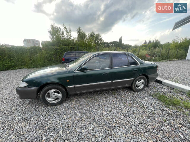 Зеленый Хендай Соната, объемом двигателя 2 л и пробегом 291 тыс. км за 1550 $, фото 5 на Automoto.ua