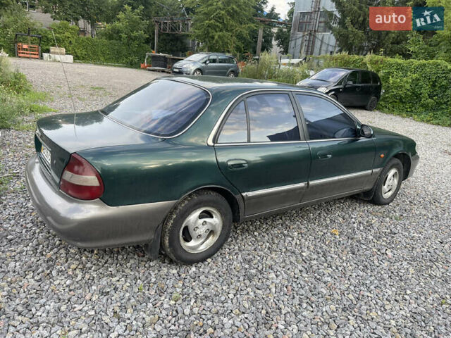 Зеленый Хендай Соната, объемом двигателя 2 л и пробегом 291 тыс. км за 1550 $, фото 4 на Automoto.ua