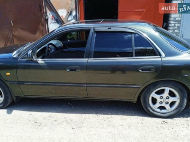 Зеленый Хендай Соната, объемом двигателя 2 л и пробегом 225 тыс. км за 2600 $, фото 5 на Automoto.ua