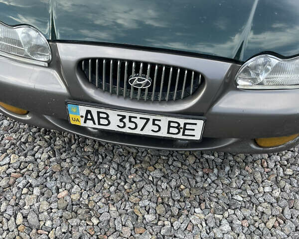 Зеленый Хендай Соната, объемом двигателя 2 л и пробегом 291 тыс. км за 1550 $, фото 8 на Automoto.ua