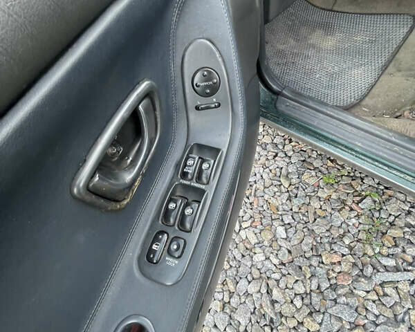 Зеленый Хендай Соната, объемом двигателя 2 л и пробегом 291 тыс. км за 1550 $, фото 9 на Automoto.ua