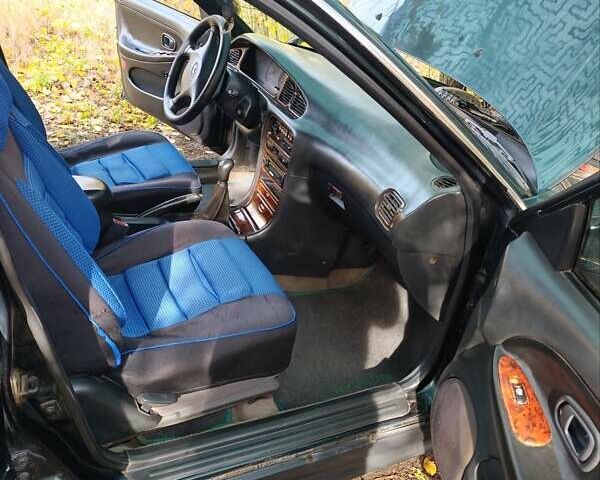 Зеленый Хендай Соната, объемом двигателя 2 л и пробегом 312 тыс. км за 1800 $, фото 10 на Automoto.ua