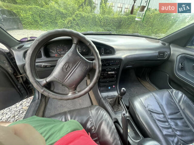 Зеленый Хендай Соната, объемом двигателя 2 л и пробегом 291 тыс. км за 1550 $, фото 10 на Automoto.ua