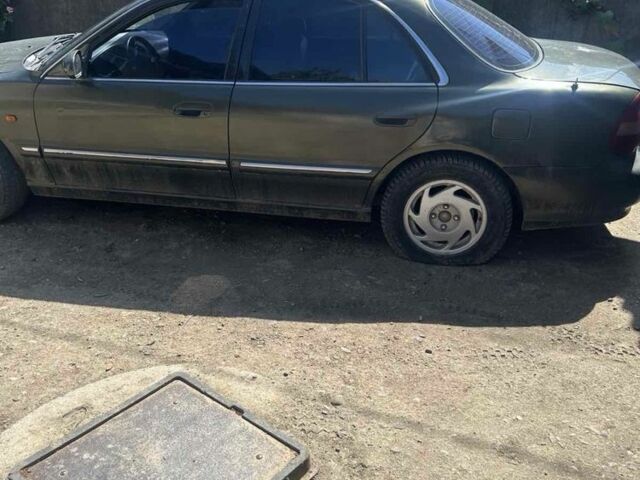 Зелений Хендай Соната, об'ємом двигуна 2 л та пробігом 500 тис. км за 750 $, фото 1 на Automoto.ua