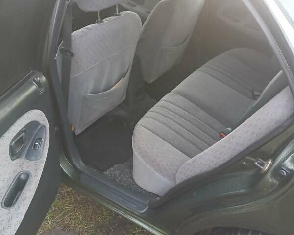 Зелений Хендай Соната, об'ємом двигуна 2 л та пробігом 506 тис. км за 3000 $, фото 4 на Automoto.ua