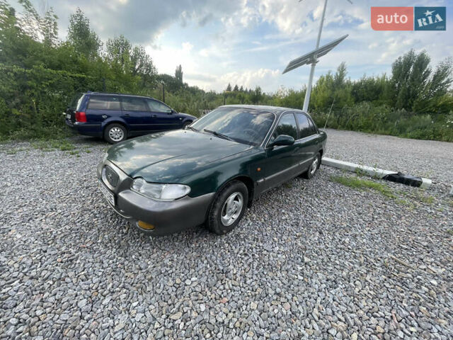 Зеленый Хендай Соната, объемом двигателя 2 л и пробегом 291 тыс. км за 1550 $, фото 2 на Automoto.ua