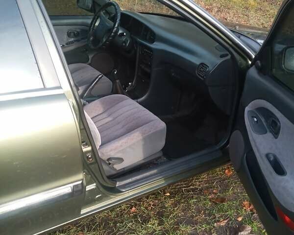 Зелений Хендай Соната, об'ємом двигуна 2 л та пробігом 506 тис. км за 3000 $, фото 6 на Automoto.ua