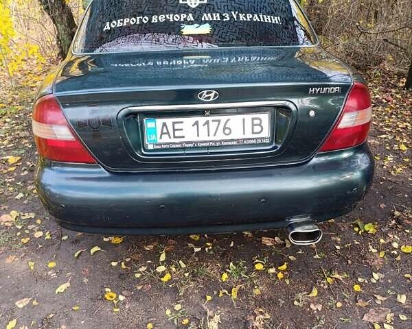 Зеленый Хендай Соната, объемом двигателя 2 л и пробегом 312 тыс. км за 1800 $, фото 4 на Automoto.ua