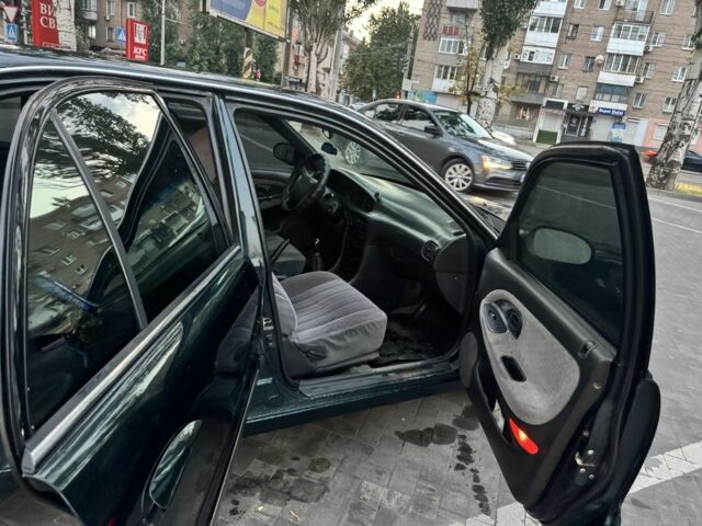 Зеленый Хендай Соната, объемом двигателя 2 л и пробегом 478 тыс. км за 1800 $, фото 6 на Automoto.ua