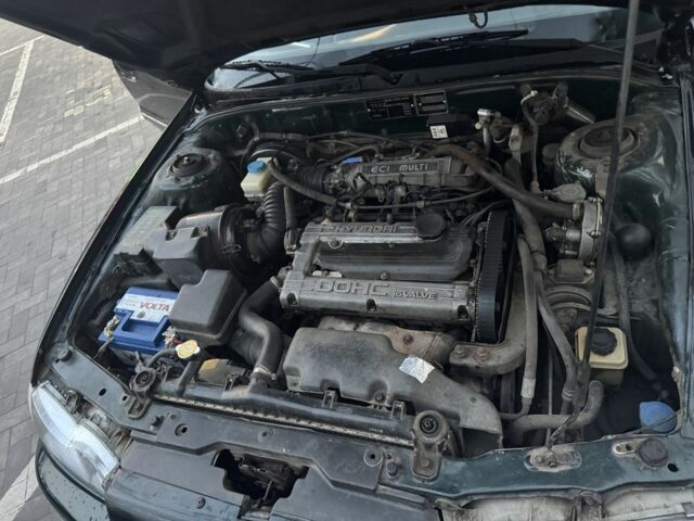 Зеленый Хендай Соната, объемом двигателя 2 л и пробегом 478 тыс. км за 1800 $, фото 7 на Automoto.ua