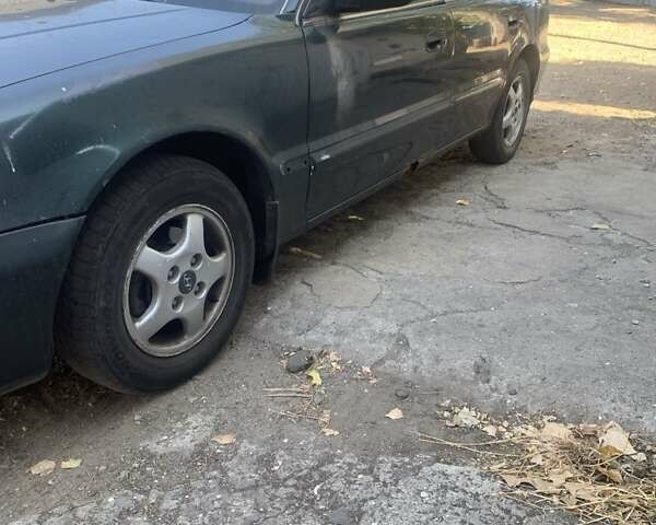 Зеленый Хендай Соната, объемом двигателя 2 л и пробегом 205 тыс. км за 1200 $, фото 2 на Automoto.ua