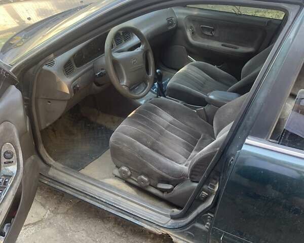 Зеленый Хендай Соната, объемом двигателя 2 л и пробегом 205 тыс. км за 1200 $, фото 7 на Automoto.ua