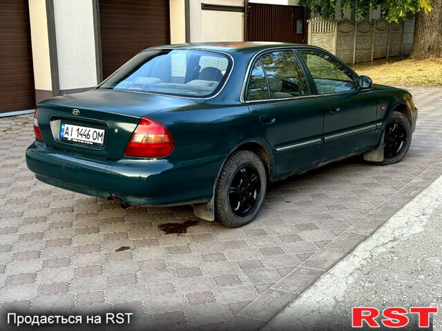 Зеленый Хендай Соната, объемом двигателя 2 л и пробегом 555 тыс. км за 1275 $, фото 4 на Automoto.ua