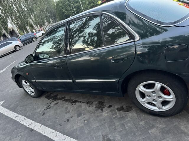 Зеленый Хендай Соната, объемом двигателя 2 л и пробегом 478 тыс. км за 1800 $, фото 3 на Automoto.ua