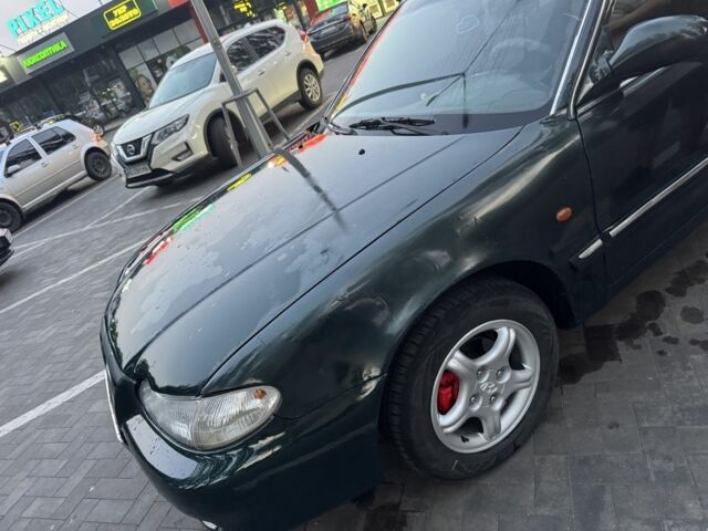 Зеленый Хендай Соната, объемом двигателя 2 л и пробегом 478 тыс. км за 1800 $, фото 4 на Automoto.ua