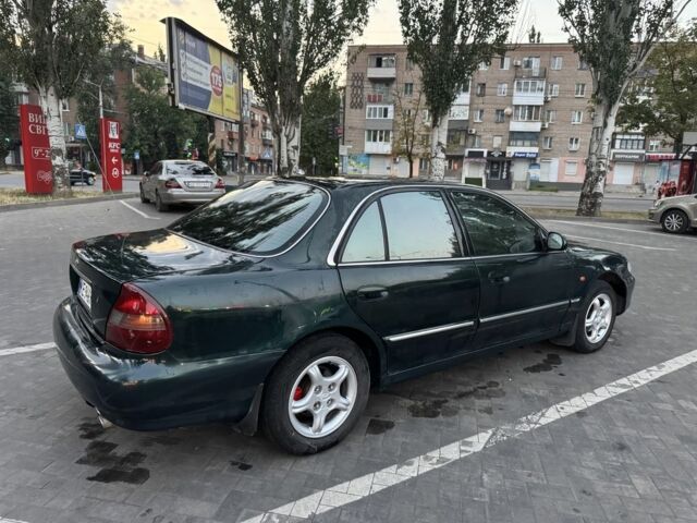 Зеленый Хендай Соната, объемом двигателя 2 л и пробегом 478 тыс. км за 1800 $, фото 2 на Automoto.ua