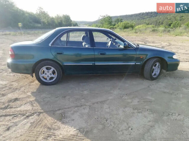 Зелений Хендай Соната, об'ємом двигуна 1.98 л та пробігом 335 тис. км за 2500 $, фото 1 на Automoto.ua