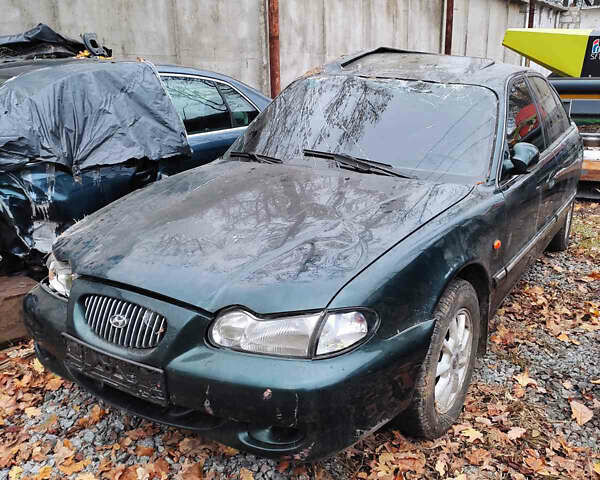 Зеленый Хендай Соната, объемом двигателя 2 л и пробегом 235 тыс. км за 1300 $, фото 2 на Automoto.ua