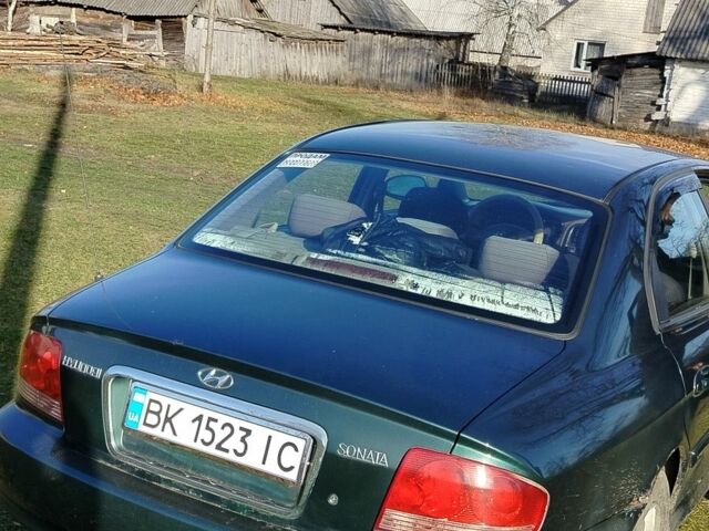 Зеленый Хендай Соната, объемом двигателя 2 л и пробегом 257 тыс. км за 3000 $, фото 2 на Automoto.ua