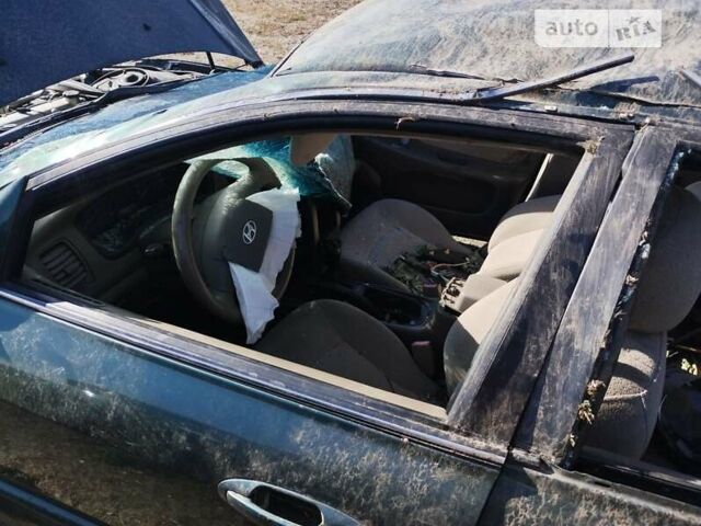 Зеленый Хендай Соната, объемом двигателя 2 л и пробегом 210 тыс. км за 1000 $, фото 2 на Automoto.ua