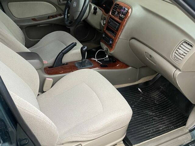 Зеленый Хендай Соната, объемом двигателя 2 л и пробегом 201 тыс. км за 2850 $, фото 9 на Automoto.ua