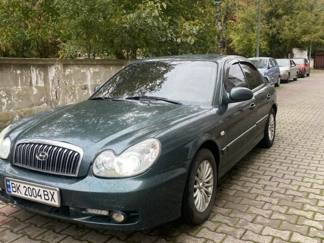 Зеленый Хендай Соната, объемом двигателя 2 л и пробегом 201 тыс. км за 2850 $, фото 1 на Automoto.ua