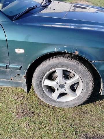 Зеленый Хендай Соната, объемом двигателя 2 л и пробегом 257 тыс. км за 3000 $, фото 2 на Automoto.ua