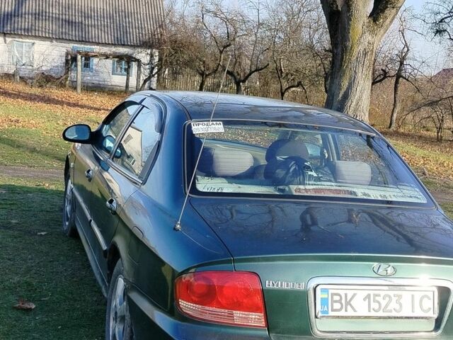 Зеленый Хендай Соната, объемом двигателя 2 л и пробегом 257 тыс. км за 3000 $, фото 4 на Automoto.ua