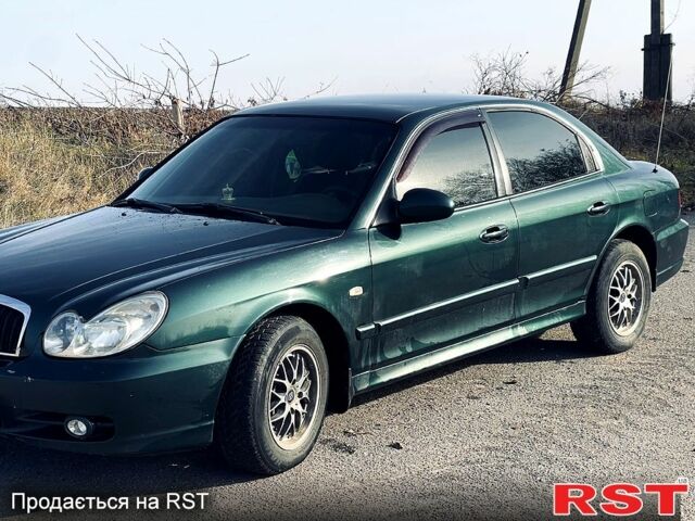Зеленый Хендай Соната, объемом двигателя 2 л и пробегом 250 тыс. км за 3500 $, фото 3 на Automoto.ua