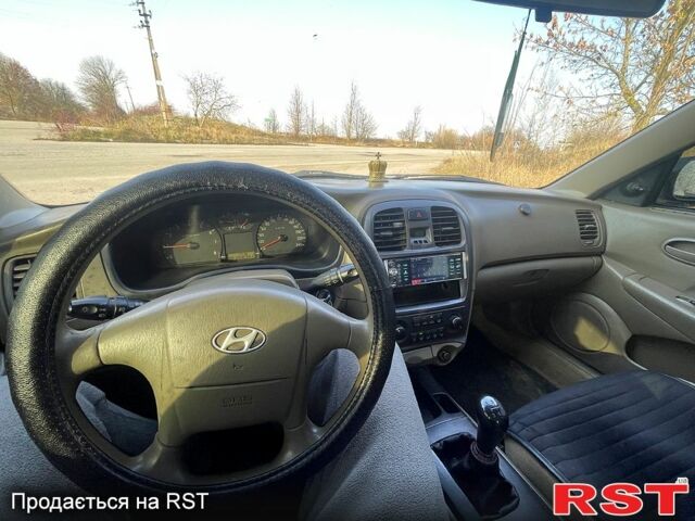 Зеленый Хендай Соната, объемом двигателя 2 л и пробегом 250 тыс. км за 3500 $, фото 6 на Automoto.ua