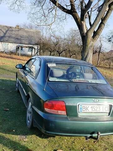 Зеленый Хендай Соната, объемом двигателя 2 л и пробегом 257 тыс. км за 3000 $, фото 3 на Automoto.ua