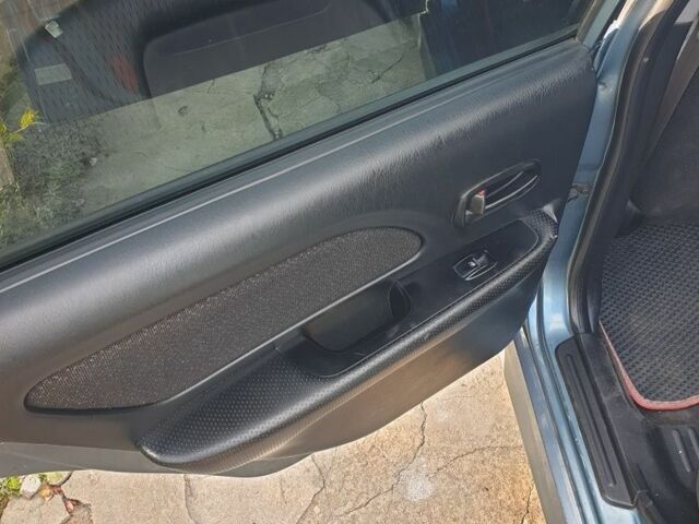 Зеленый Хендай Соната, объемом двигателя 2 л и пробегом 245 тыс. км за 3100 $, фото 10 на Automoto.ua