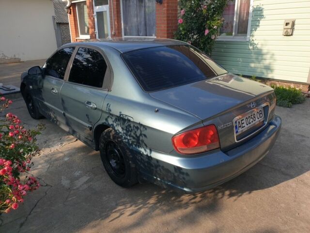 Зеленый Хендай Соната, объемом двигателя 2 л и пробегом 245 тыс. км за 3100 $, фото 2 на Automoto.ua