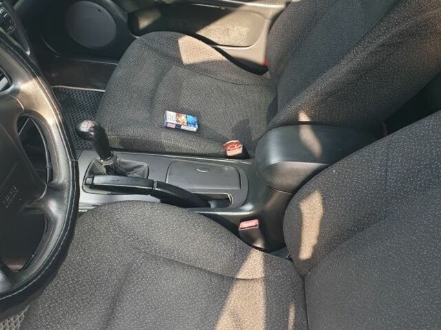 Зеленый Хендай Соната, объемом двигателя 2 л и пробегом 245 тыс. км за 3100 $, фото 9 на Automoto.ua