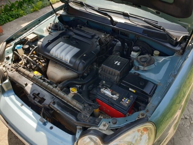 Зеленый Хендай Соната, объемом двигателя 2 л и пробегом 245 тыс. км за 3100 $, фото 12 на Automoto.ua