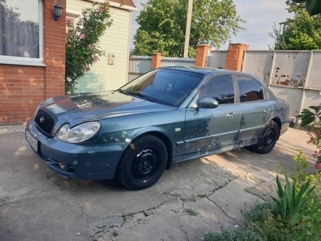 Зеленый Хендай Соната, объемом двигателя 2 л и пробегом 245 тыс. км за 3100 $, фото 3 на Automoto.ua