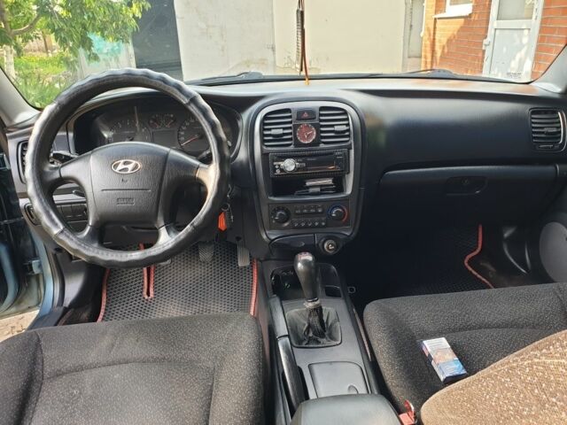 Зеленый Хендай Соната, объемом двигателя 2 л и пробегом 245 тыс. км за 3100 $, фото 6 на Automoto.ua