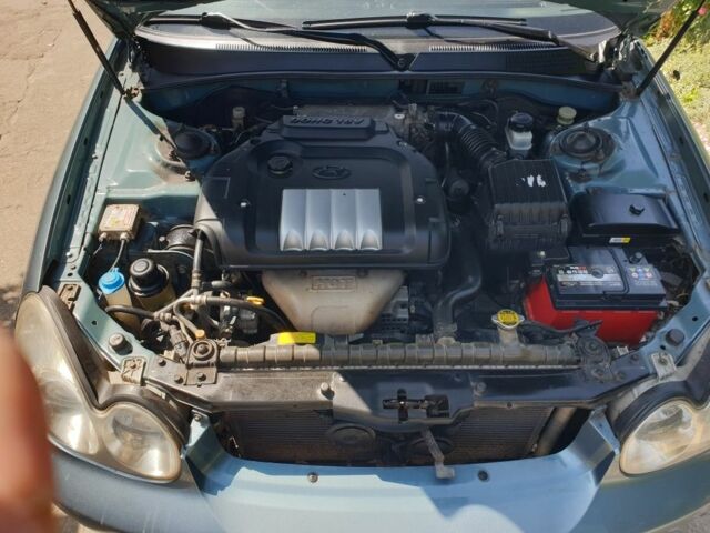 Зеленый Хендай Соната, объемом двигателя 2 л и пробегом 245 тыс. км за 3100 $, фото 13 на Automoto.ua