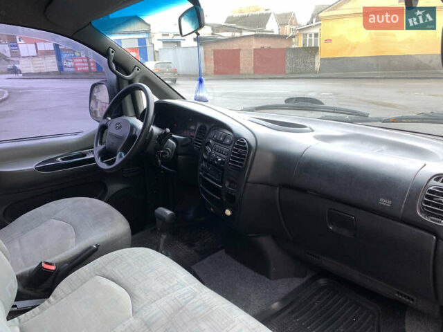 Серый Хендай Старекс, объемом двигателя 2.48 л и пробегом 191 тыс. км за 5000 $, фото 13 на Automoto.ua
