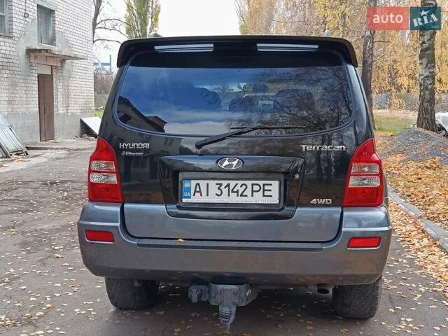 Черный Хендай Терракан, объемом двигателя 2.9 л и пробегом 346 тыс. км за 8500 $, фото 4 на Automoto.ua